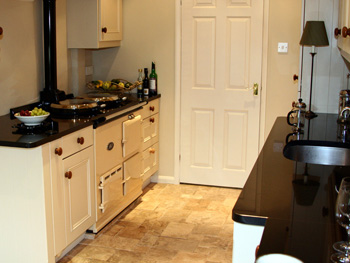 Hand-Painted Units with Dark Granite Surfaces